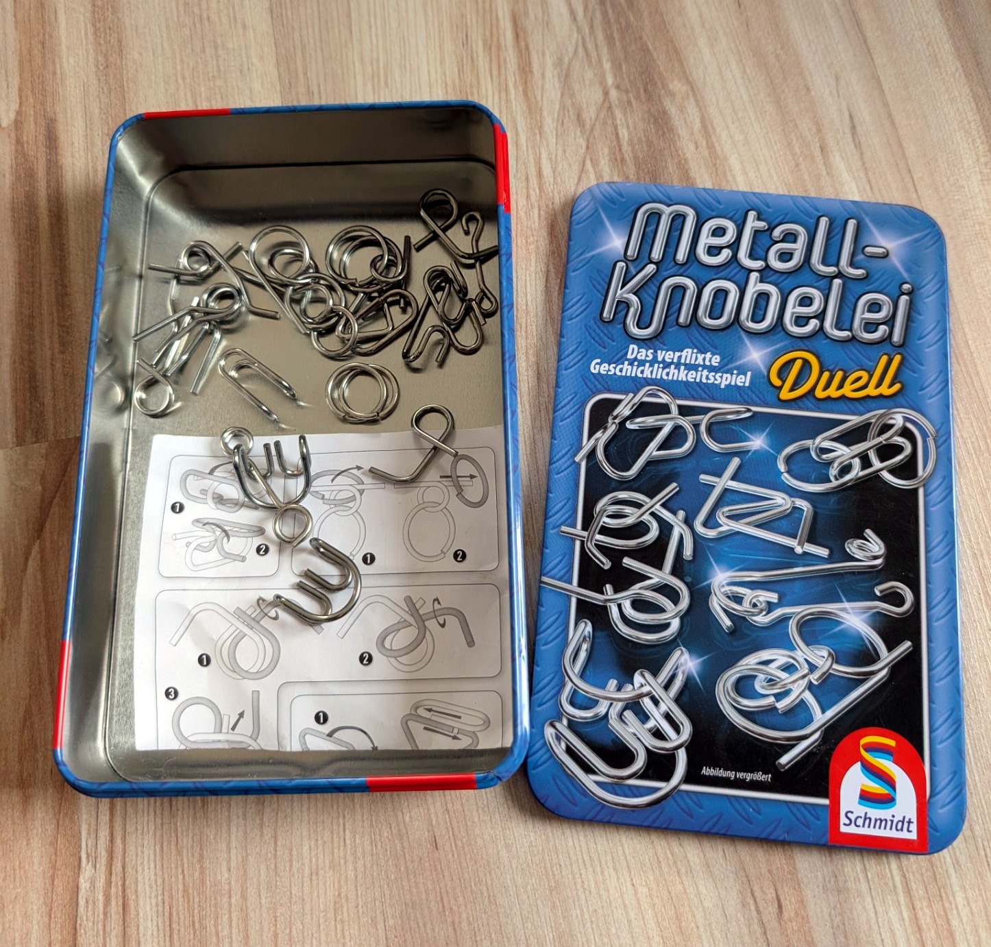 Schmidt Spiele Metall-Knobelei Duell - Geduldspiel in Metallbox
